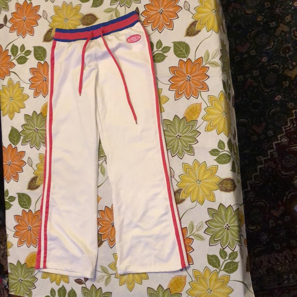“No problem” white and pink pants in good condition.